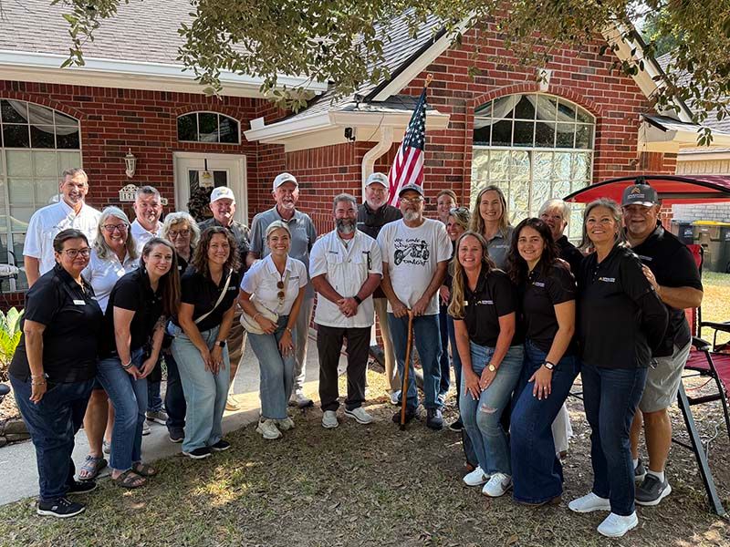 Jay Roquet with OFH staff
