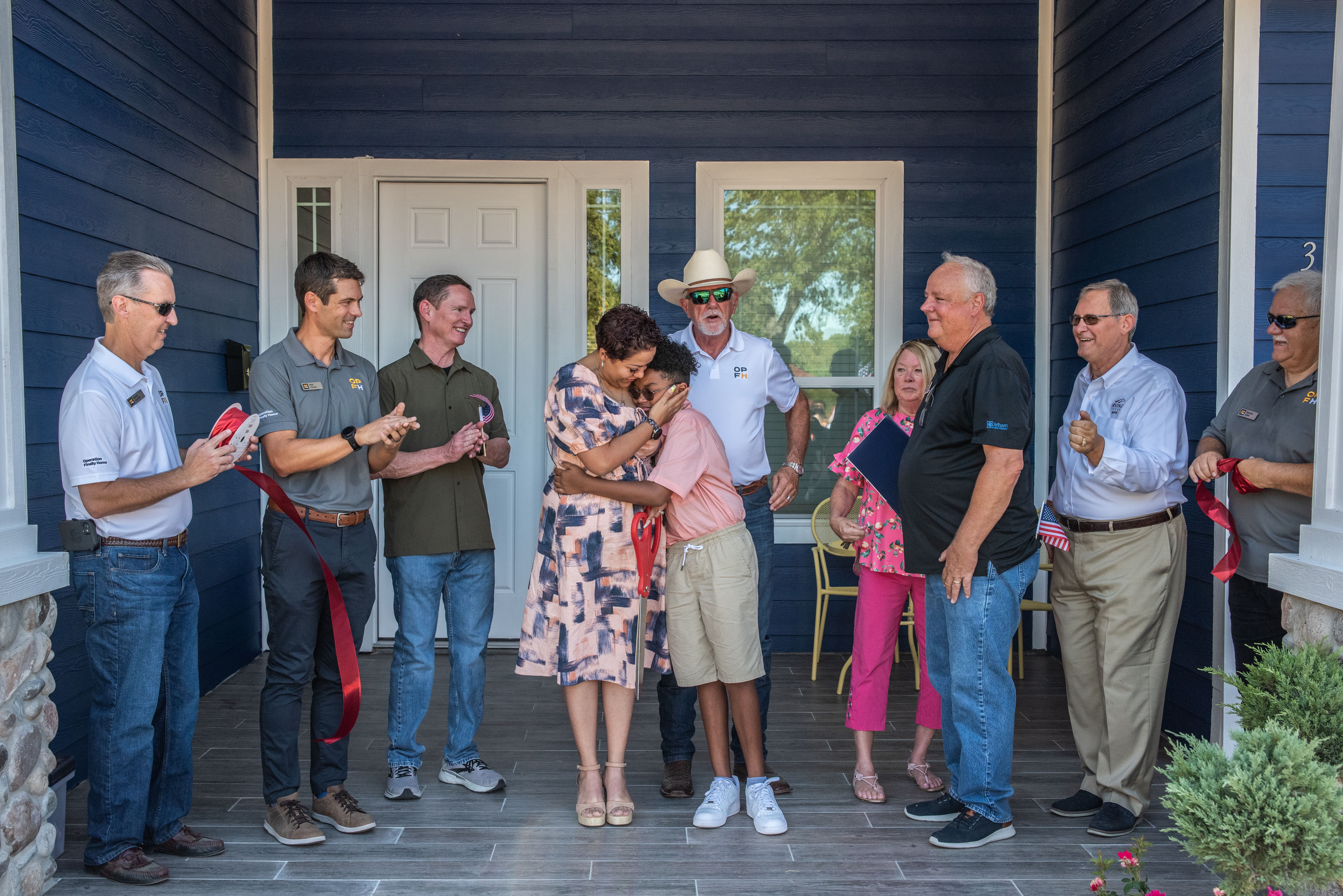 velez family in front of their home