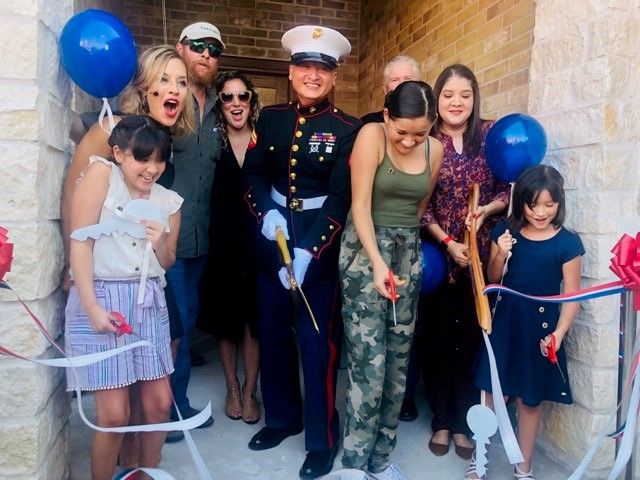 Ribbon Cutting Simental Family