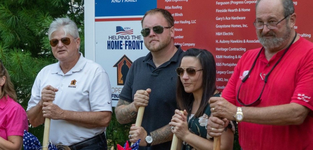 the brennan family at their groundbreaking