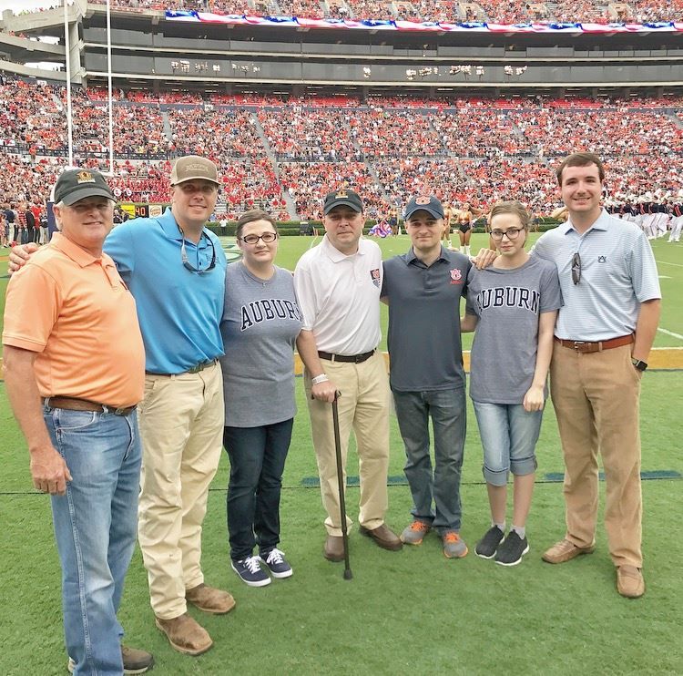 the lee family at an auburn football game
