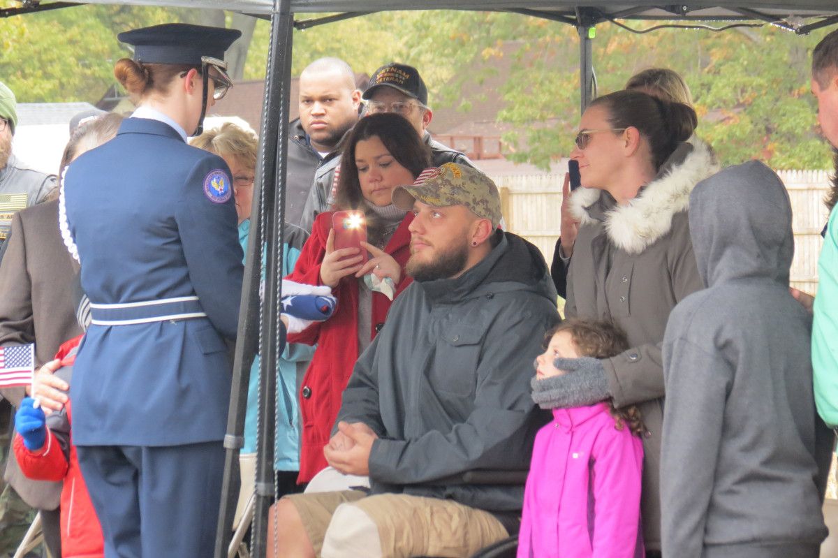 poggi family at a military ceremony