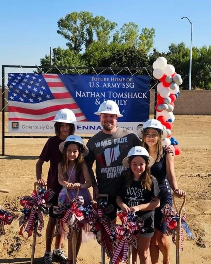 tomshack family at a groundbreaking